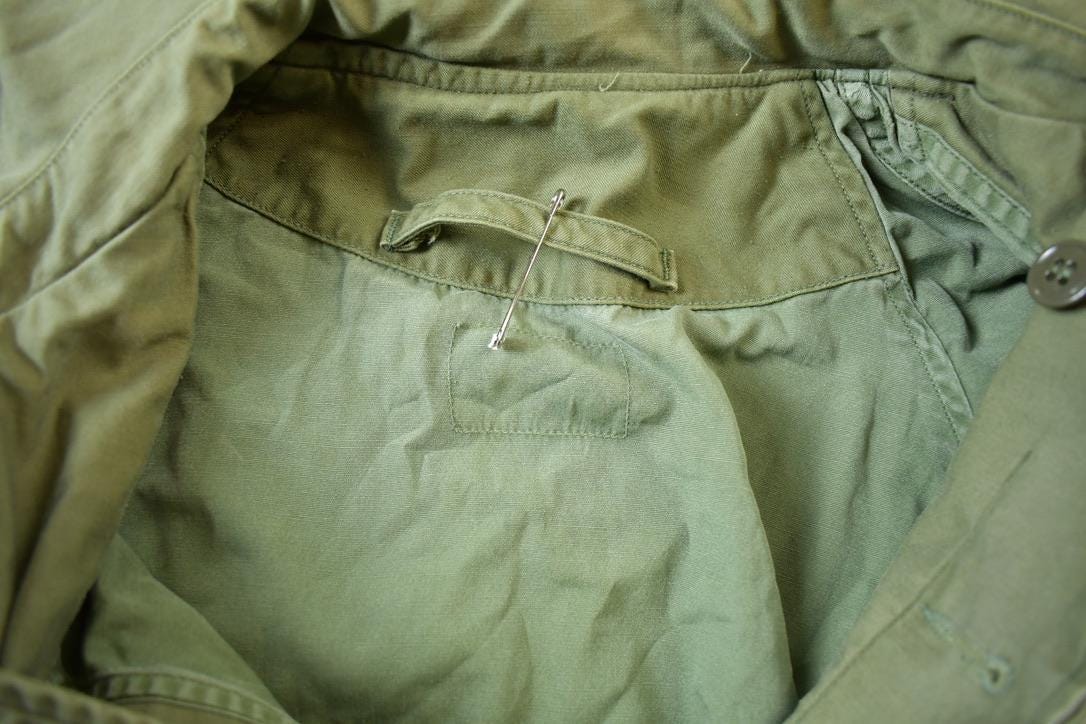 Vintage Military Button Up Lined Hooded Army Jacket Men's L from propervintagecanada