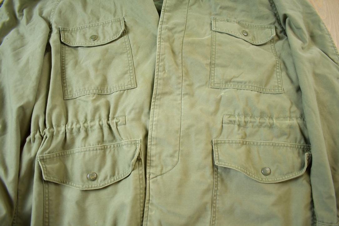 Vintage Military Button Up Lined Hooded Army Jacket Men's L from propervintagecanada