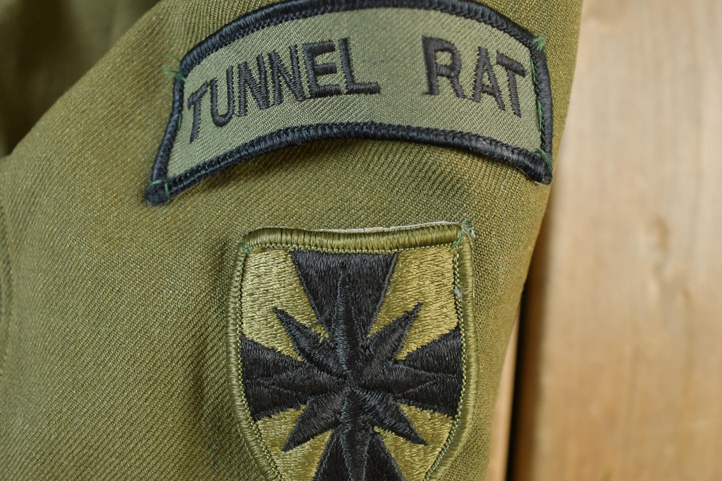 Vintage Military Jungle Expert Peace Sign Button Up Army Jacket from propervintagecanada