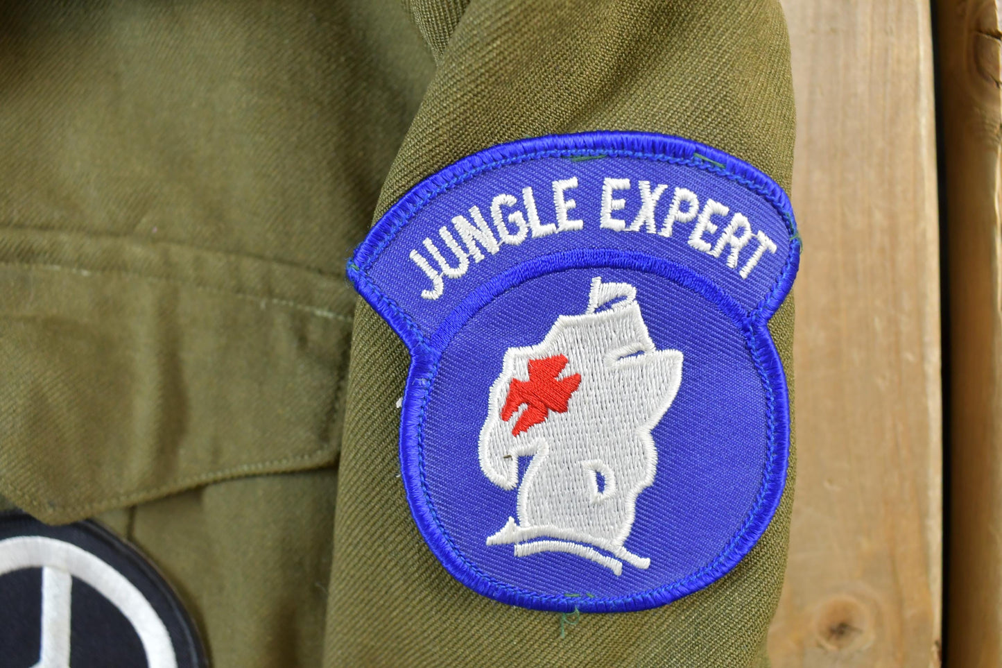 Vintage Military Jungle Expert Peace Sign Button Up Army Jacket from propervintagecanada