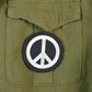 Vintage Military Jungle Expert Peace Sign Button Up Army Jacket from propervintagecanada