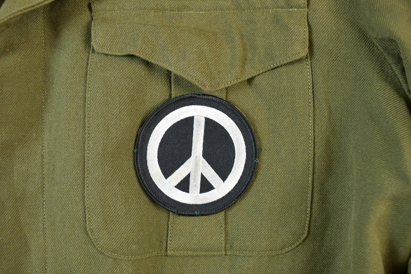 Vintage Military Jungle Expert Peace Sign Button Up Army Jacket from propervintagecanada
