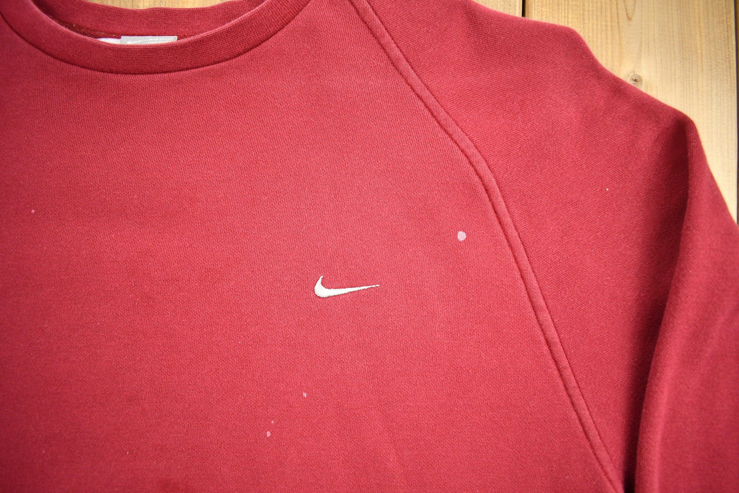 Vintage Nike Embroidered Mini Swoosh Raglan Crewneck Sweatshirt Men's 2XL from propervintagecanada