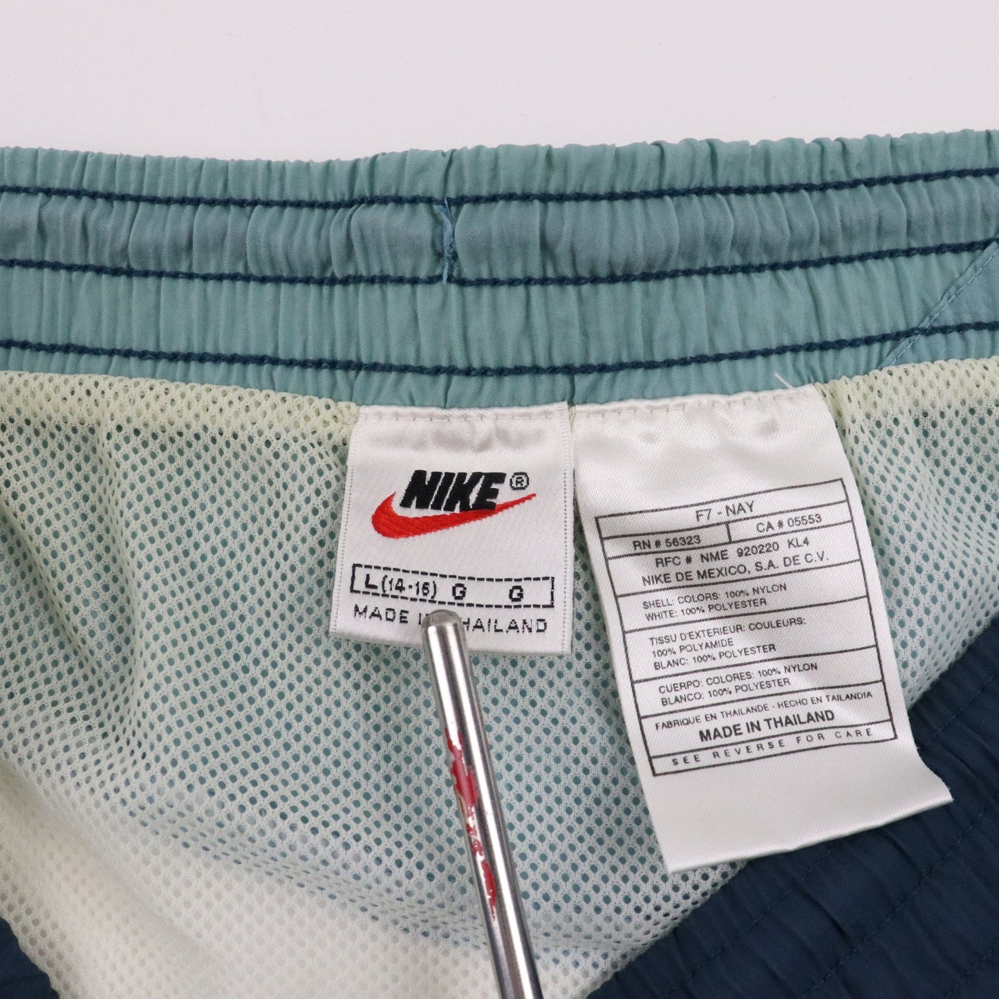 Vintage Nike Swim Trunks Womens Large Blue Swoosh Bath Suit from propervintagecanada