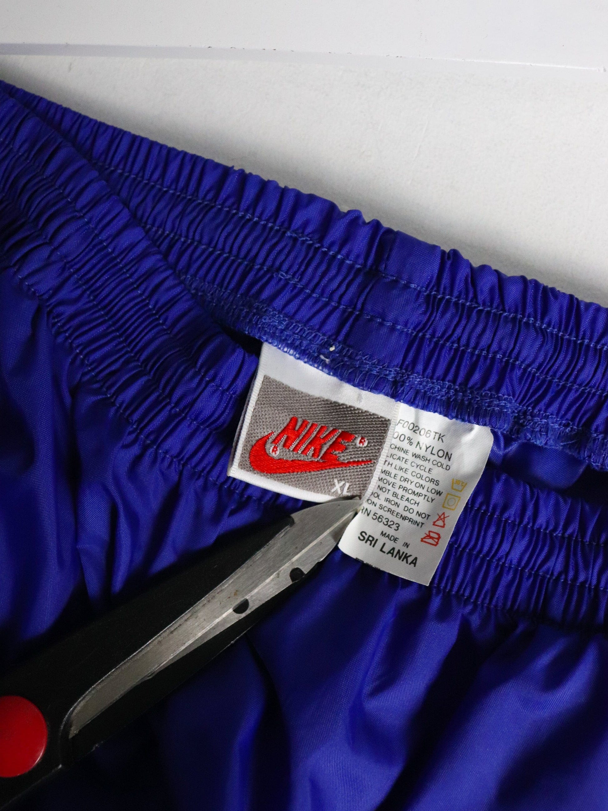 Vintage Nike Trackpants Mens XL Purple from propervintagecanada