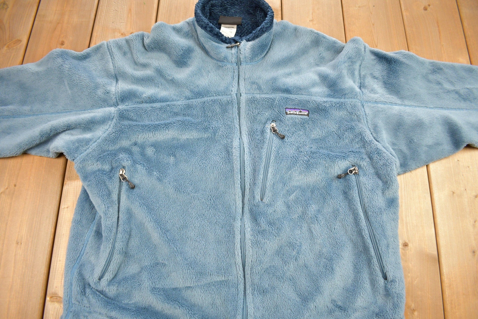 Vintage Patagonia Blue Fleece Zip Up Sweater Men's XL from propervintagecanada