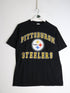 Vintage Pittsburgh Steelers T Shirt Mens Medium Black NFL from propervintagecanada
