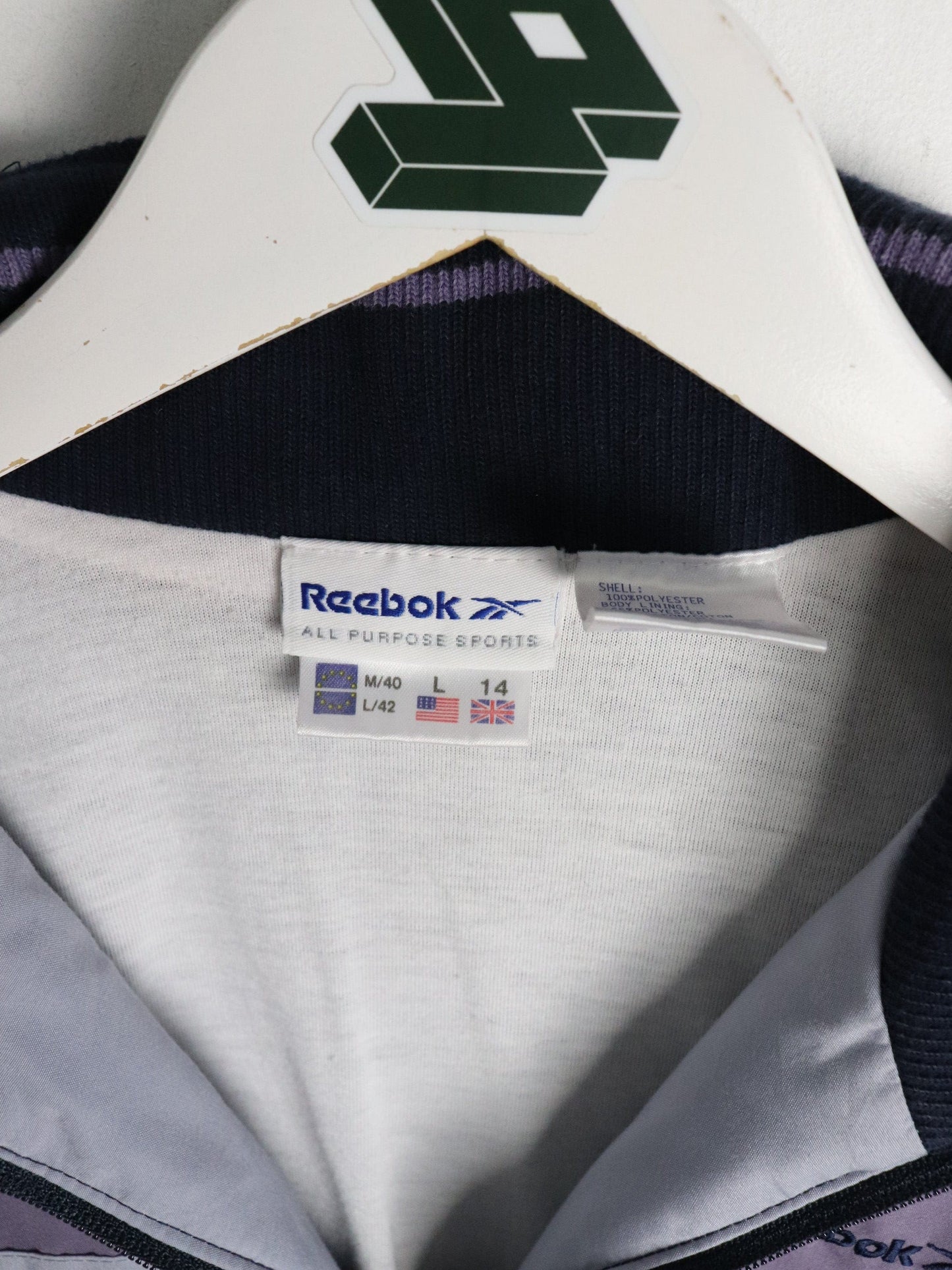 Vintage Reebok Windbreaker Womens Large Purple from propervintagecanada