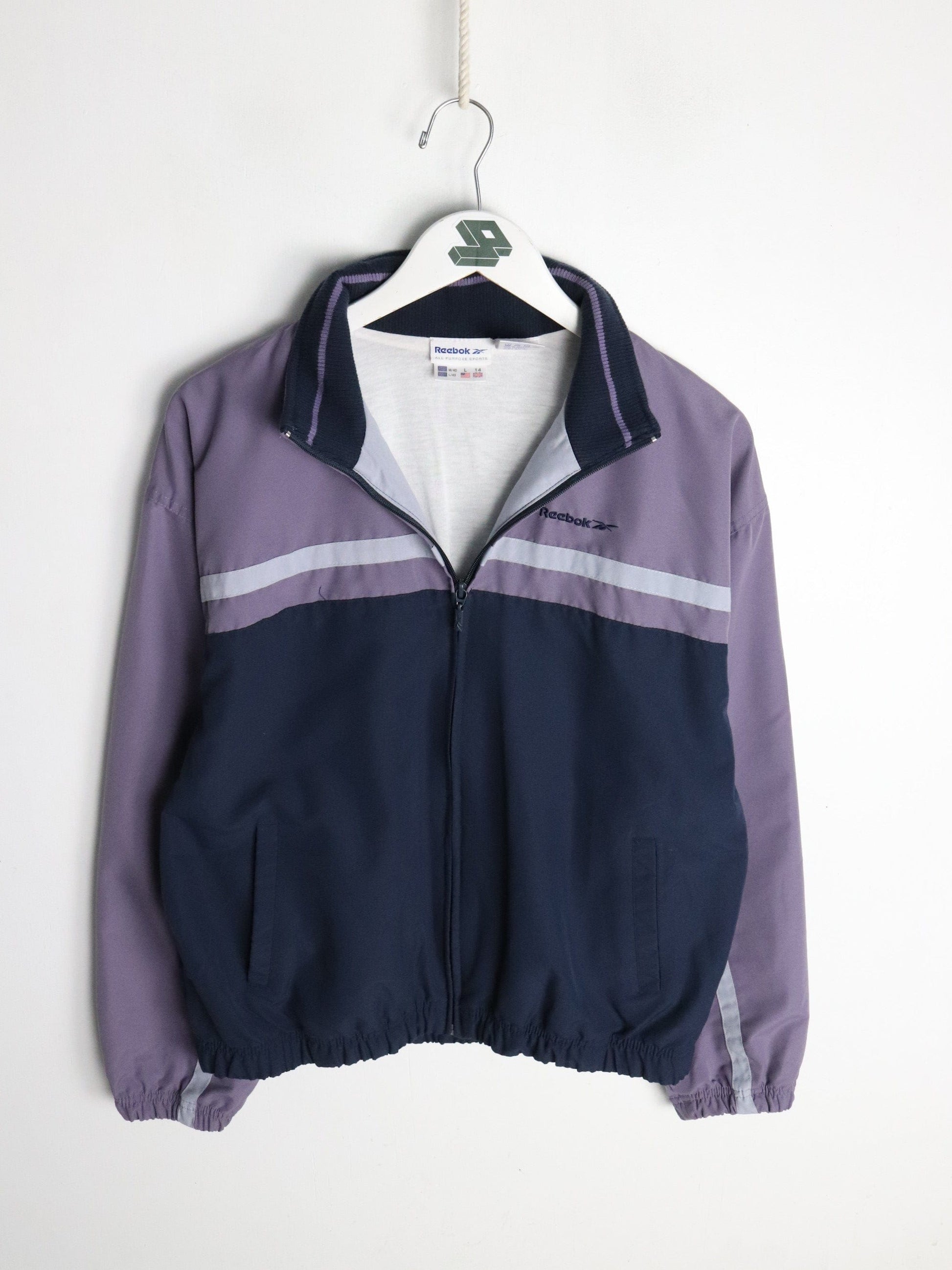 Vintage Reebok Windbreaker Womens Large Purple from propervintagecanada