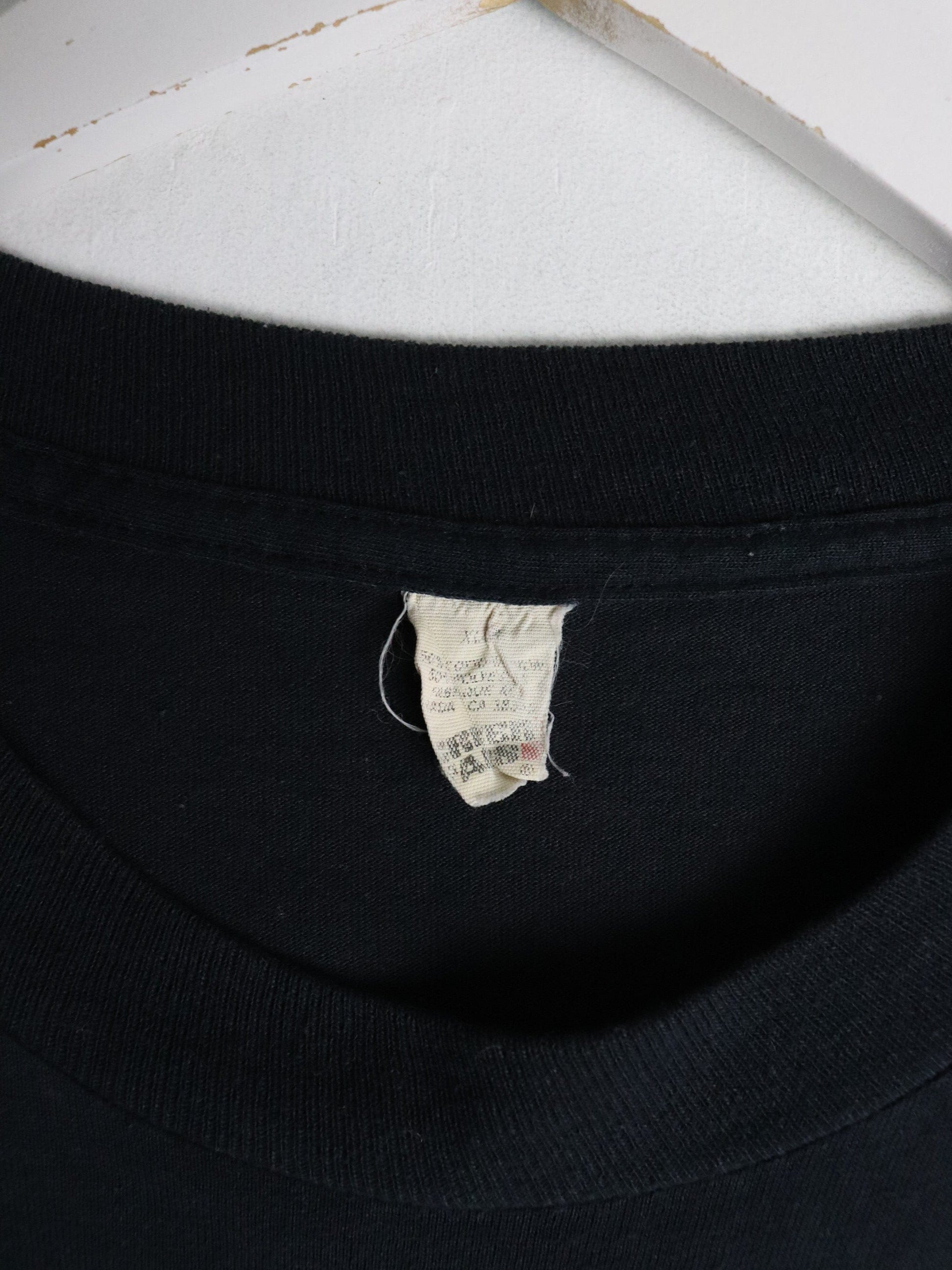 Vintage St. Catherines Redevelopment T Shirt Fits Mens Large Black 90s from propervintagecanada