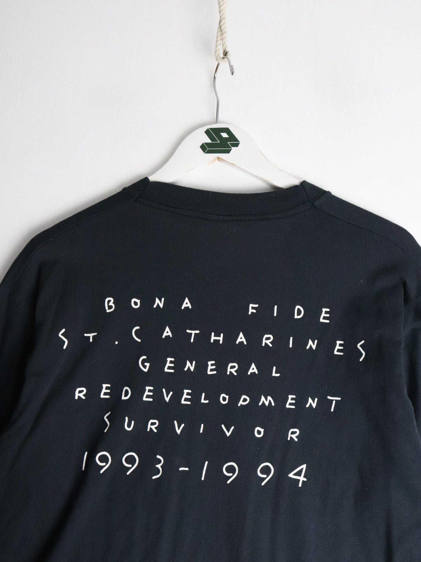 Vintage St. Catherines Redevelopment T Shirt Fits Mens Large Black 90s from propervintagecanada