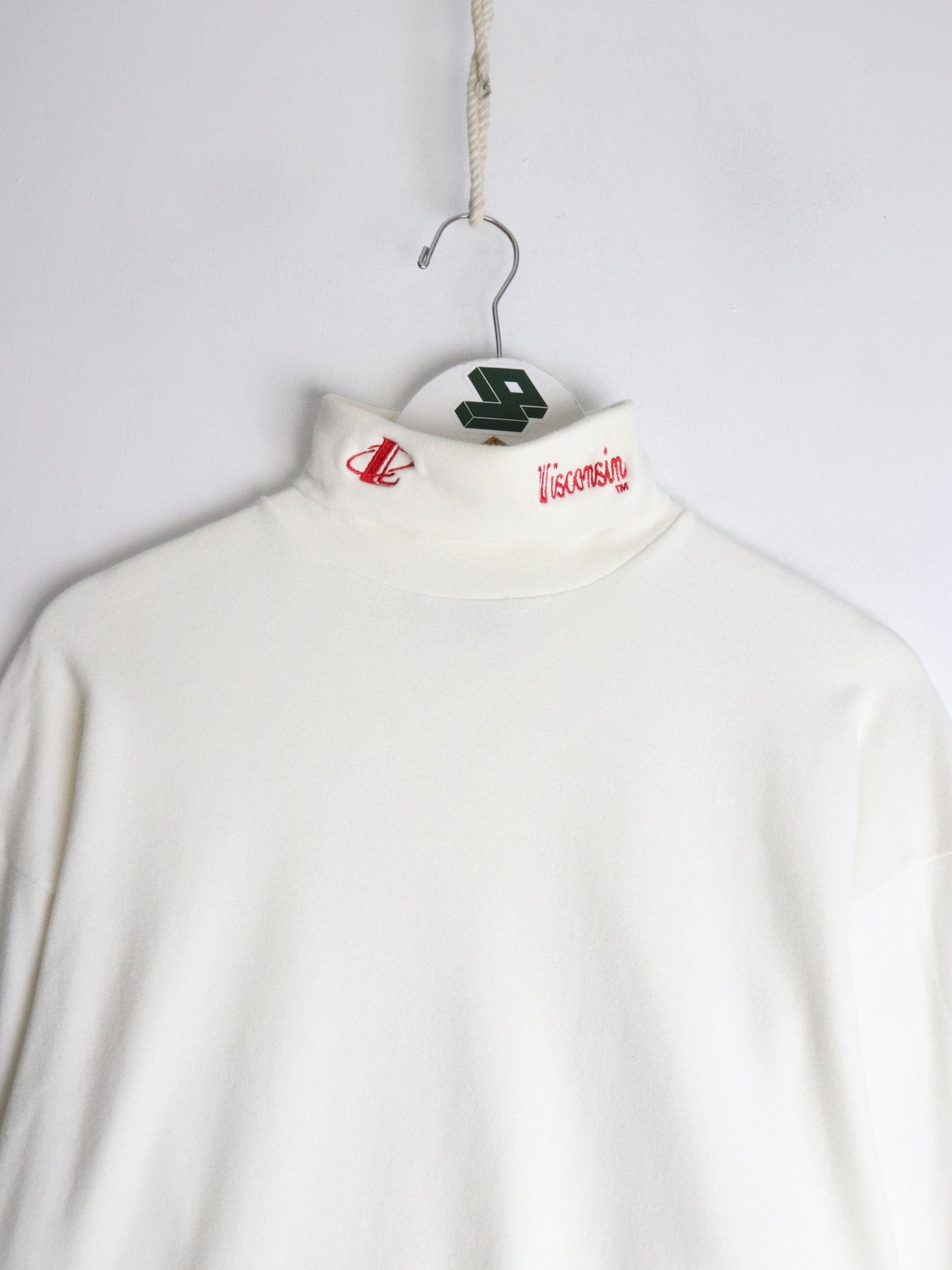 Vintage Wisconsin Badgers T Shirt Mens Large White Turtle Neck from propervintagecanada