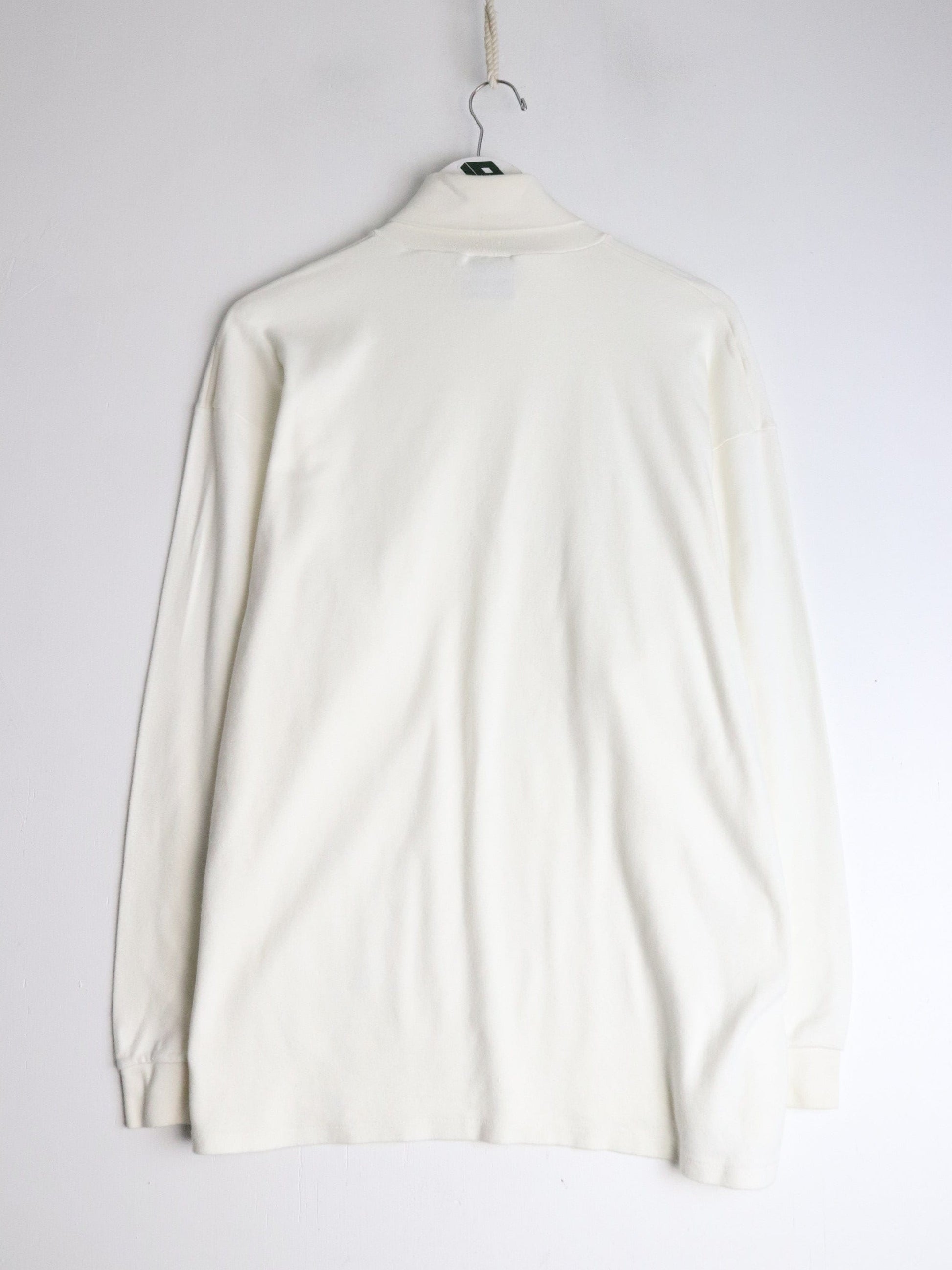 Vintage Wisconsin Badgers T Shirt Mens Large White Turtle Neck from propervintagecanada
