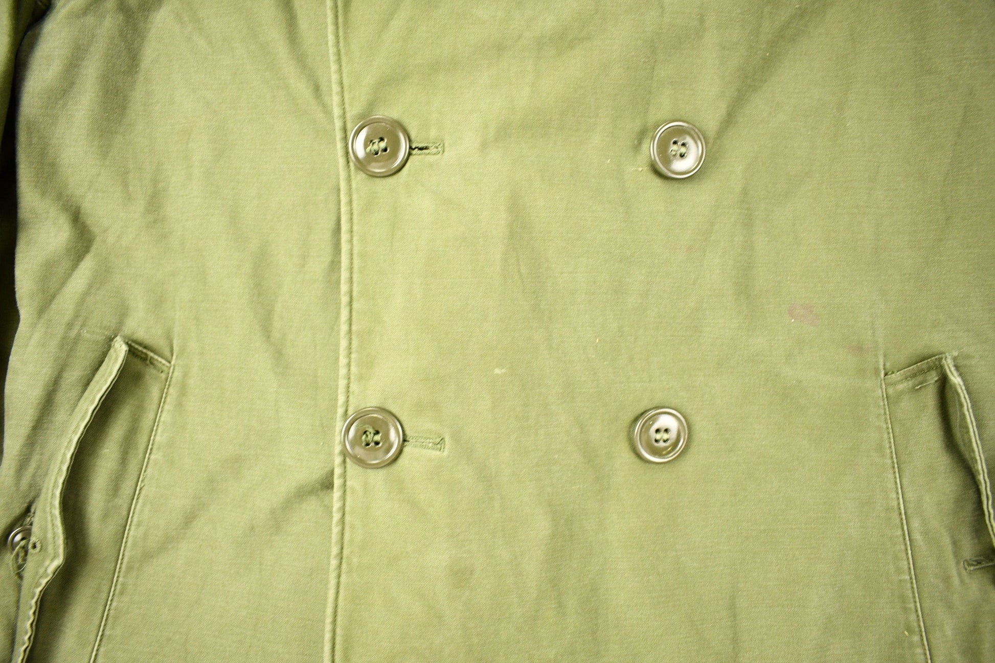 Vintage WW2 Military Button Up Trench Coat from propervintagecanada