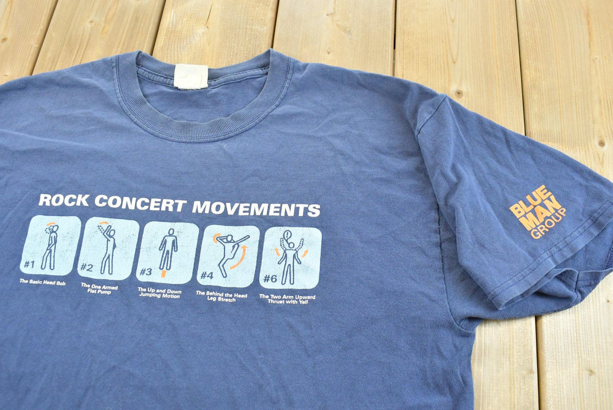 Vintage Y2K Blue Man Group Rock Concert Movements Band T-Shirt Men's L from propervintagecanada