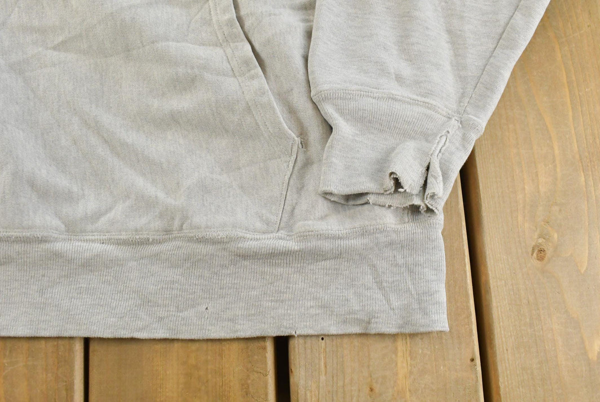Vintage Y2K Champion Reverse Weave Hoodie Sweatshirt Men's L from propervintagecanada