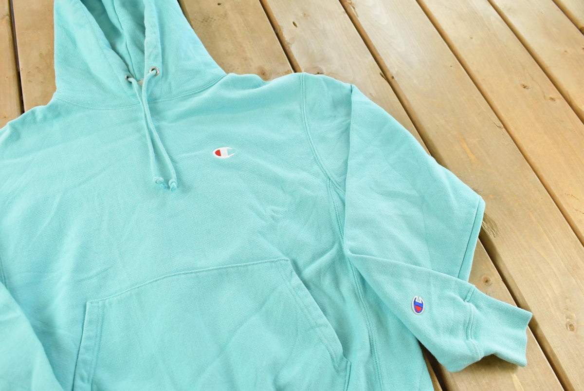 Vintage Y2K Champion Reverse Weave Hoodie Sweatshirt Men's M from propervintagecanada