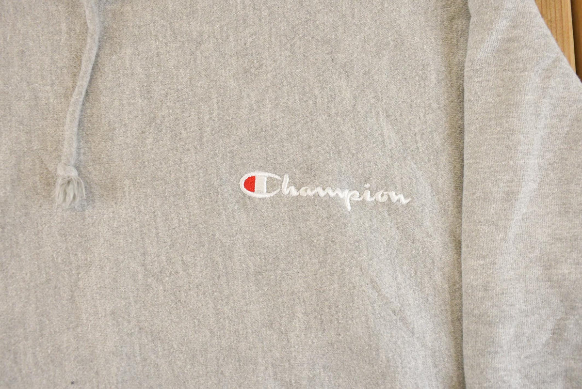 Vintage Y2K Champion Reverse Weave Hoodie Sweatshirt Men's M from propervintagecanada