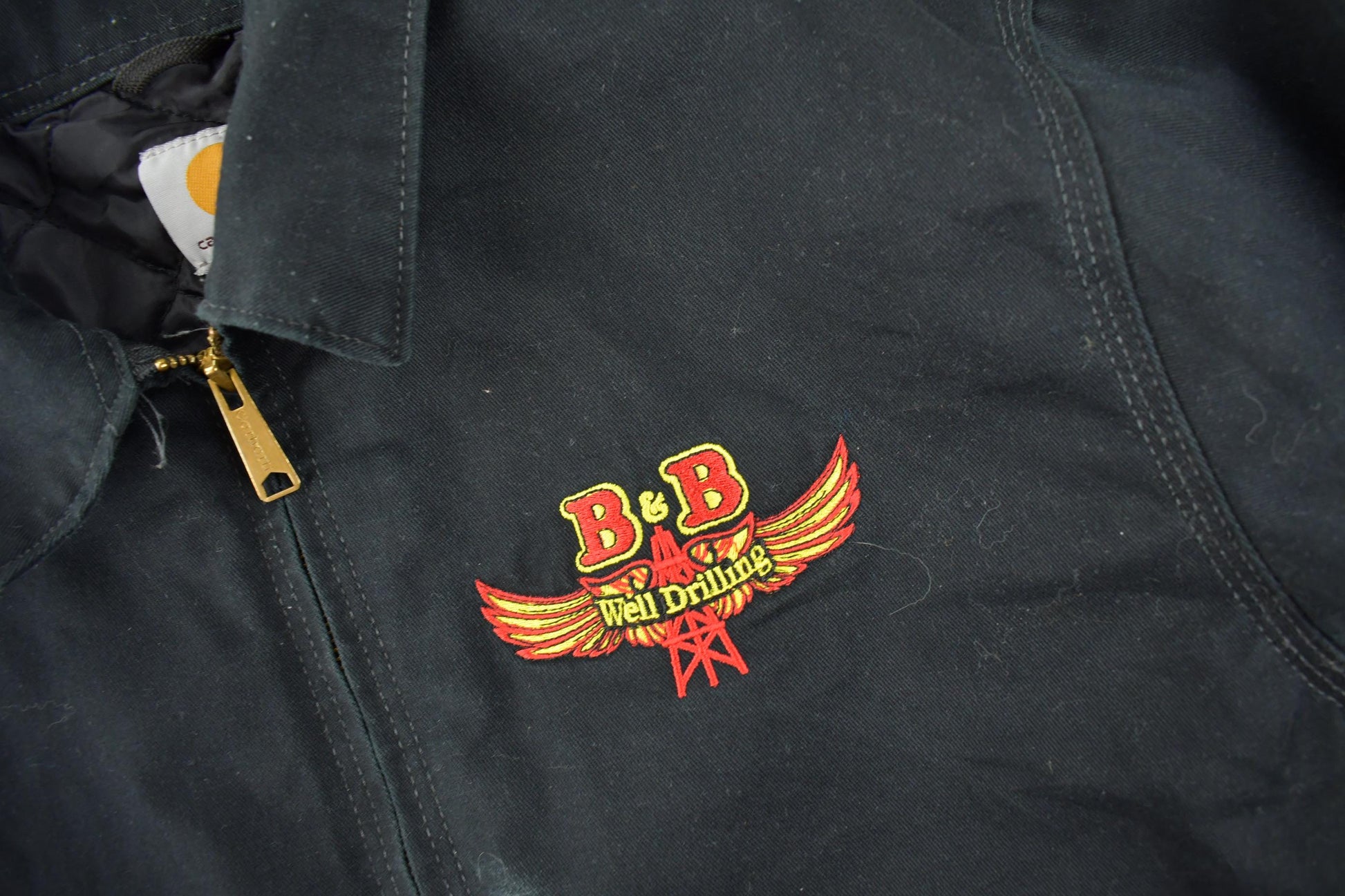 Vintage Y2K Embroidered Carhartt Detroit Jacket Size L from propervintagecanada