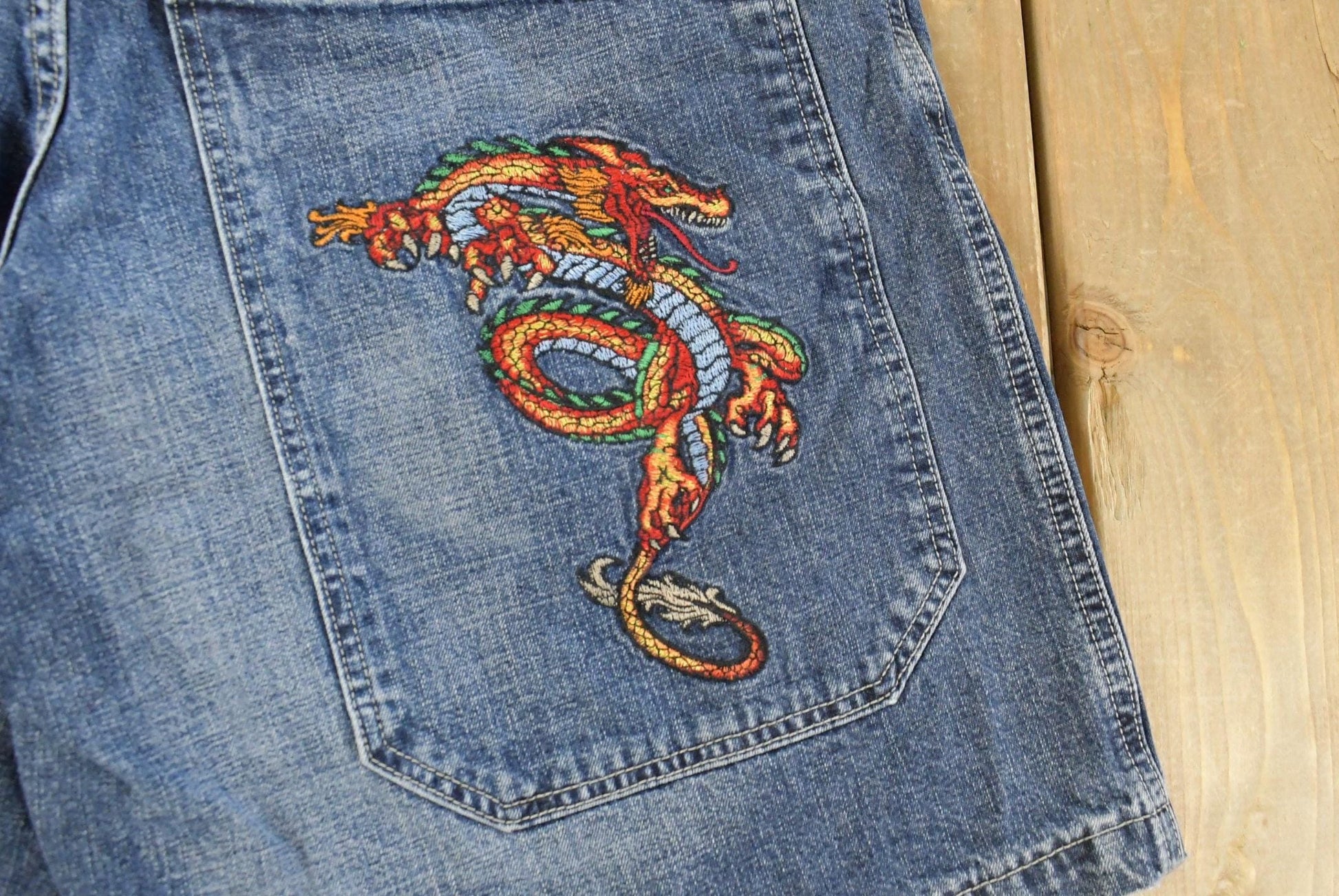 Vintage Y2K JNCO Dragon Denim Jean Shorts Men's 35 from propervintagecanada