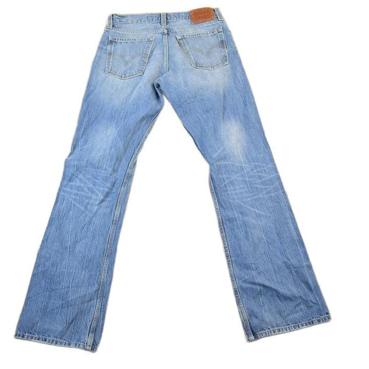 Vintage Y2K Levi Strauss Low Boot Cut Red Tab Denim Jeans Women's 24 x 30 from propervintagecanada