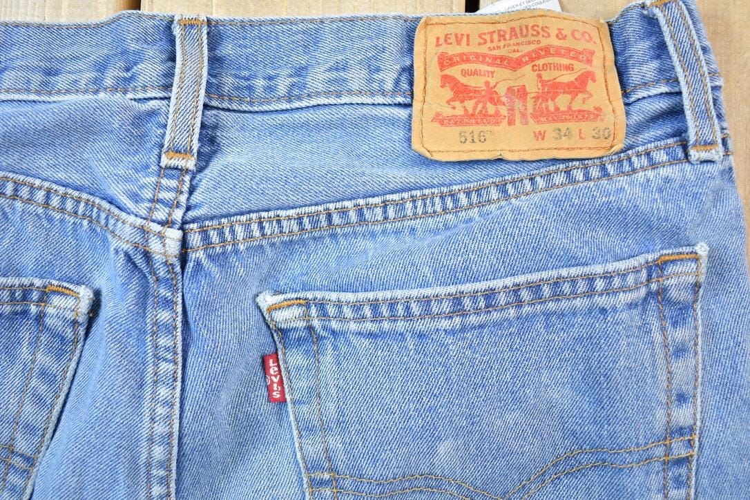 Vintage Y2K Levi Strauss Red Tab 516 Denim Jeans Men's 34 x 30 from propervintagecanada