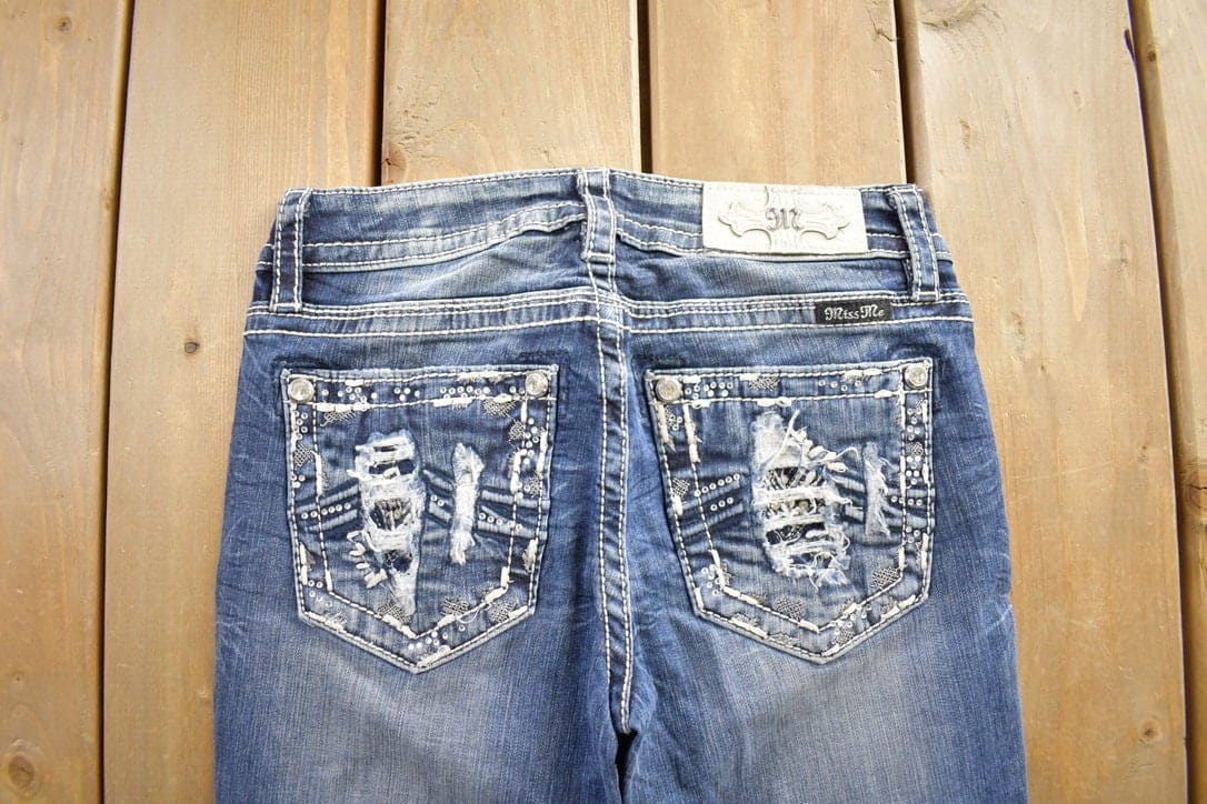 Vintage Y2K Miss Me Bedazzled Boot Cut Low Rise Jeans Size 26x36 from propervintagecanada