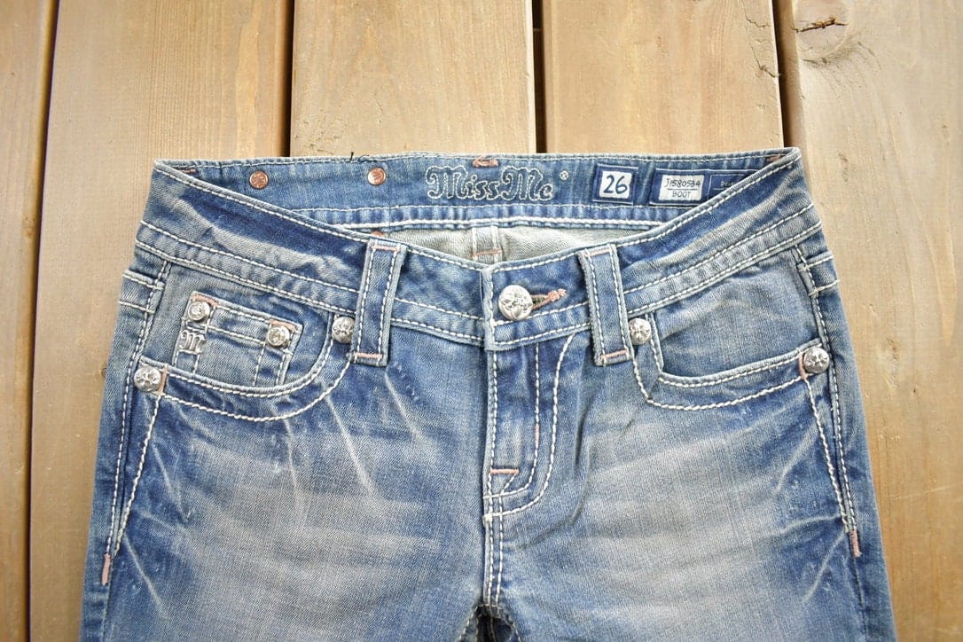 Vintage Y2K Miss Me Bedazzled Embroidered Faded Boot Cut Low Rise Jeans Women's 26 x 33 from propervintagecanada