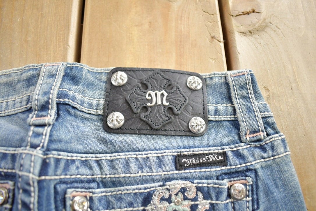 Vintage Y2K Miss Me Bedazzled Embroidered Faded Boot Cut Low Rise Jeans Women's 26 x 33 from propervintagecanada