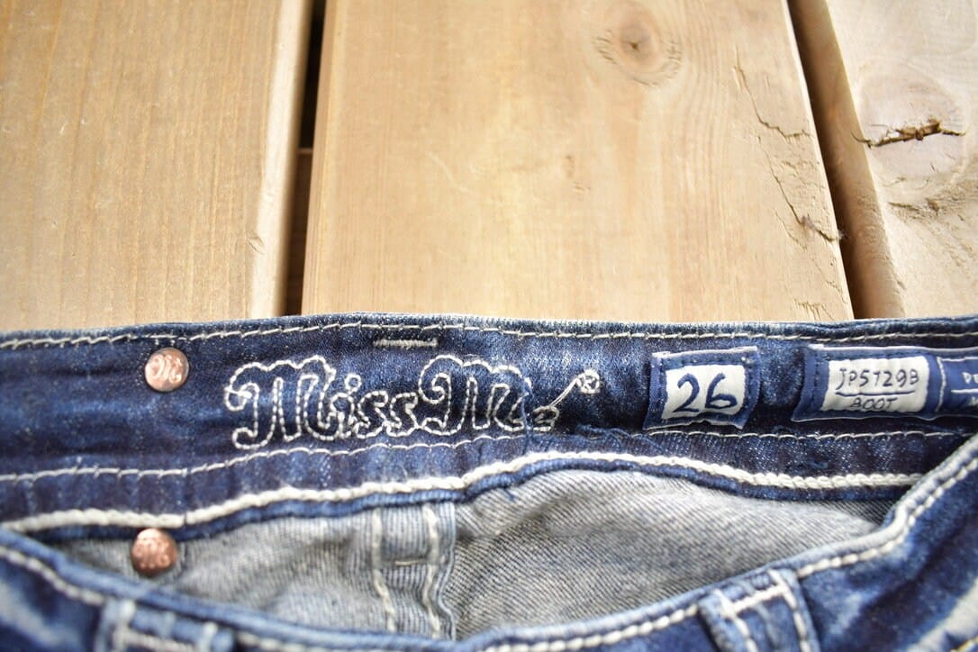 Vintage Y2K Miss Me Bedazzled Embroidered Faded Low Rise Boot Cut Low Rise Jeans Size 26x33 from propervintagecanada