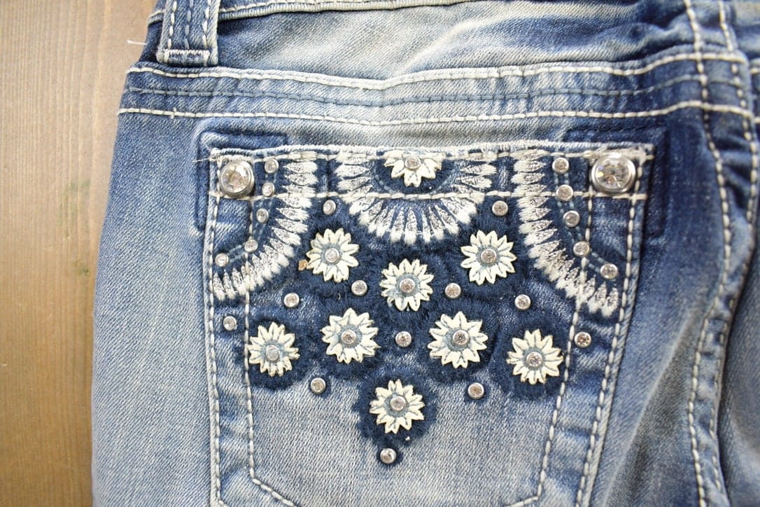 Vintage Y2K Miss Me Bedazzled Embroidered Faded Low Rise Boot Cut Low Rise Jeans Size 26x33 from propervintagecanada