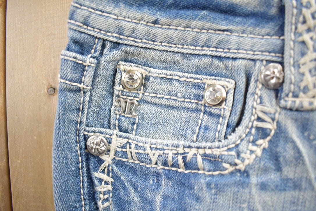 Vintage Y2K Miss Me Bedazzled Embroidered Thrashed Low Rise Boot Cut Low Rise Jeans Size 26x33 from propervintagecanada