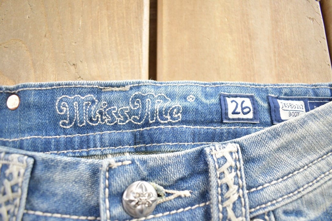 Vintage Y2K Miss Me Bedazzled Embroidered Thrashed Low Rise Boot Cut Low Rise Jeans Women's 26 x 33 from propervintagecanada