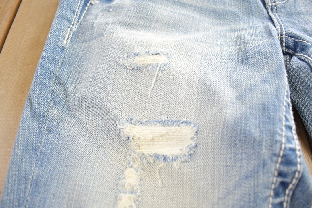 Vintage Y2K Miss Me Bedazzled Embroidered Thrashed Low Rise Boot Cut Low Rise Jeans Women's 26 x 33 from propervintagecanada