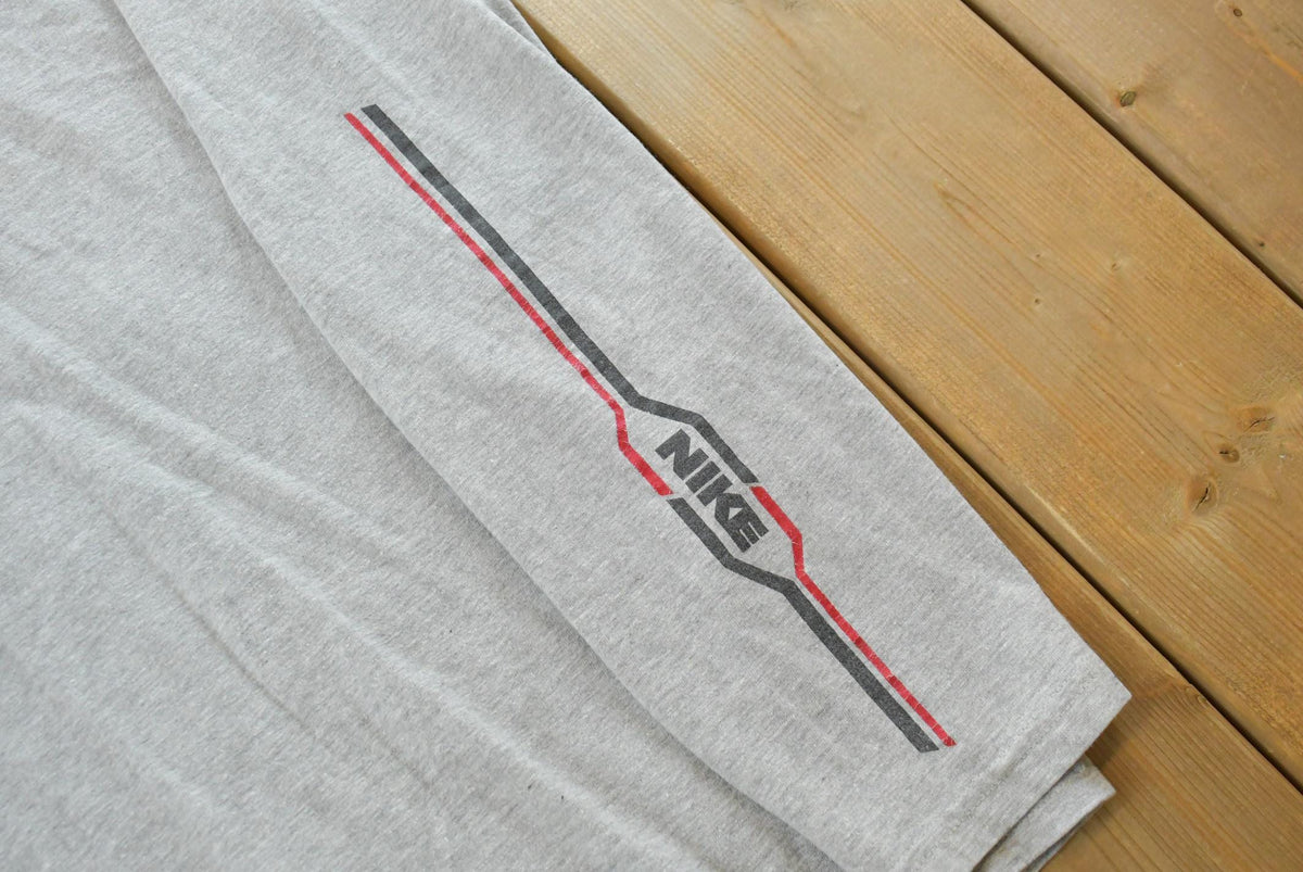 Vintage Y2K Nike Embroidered Logo Long Sleeve Shirt Men's XL from propervintagecanada