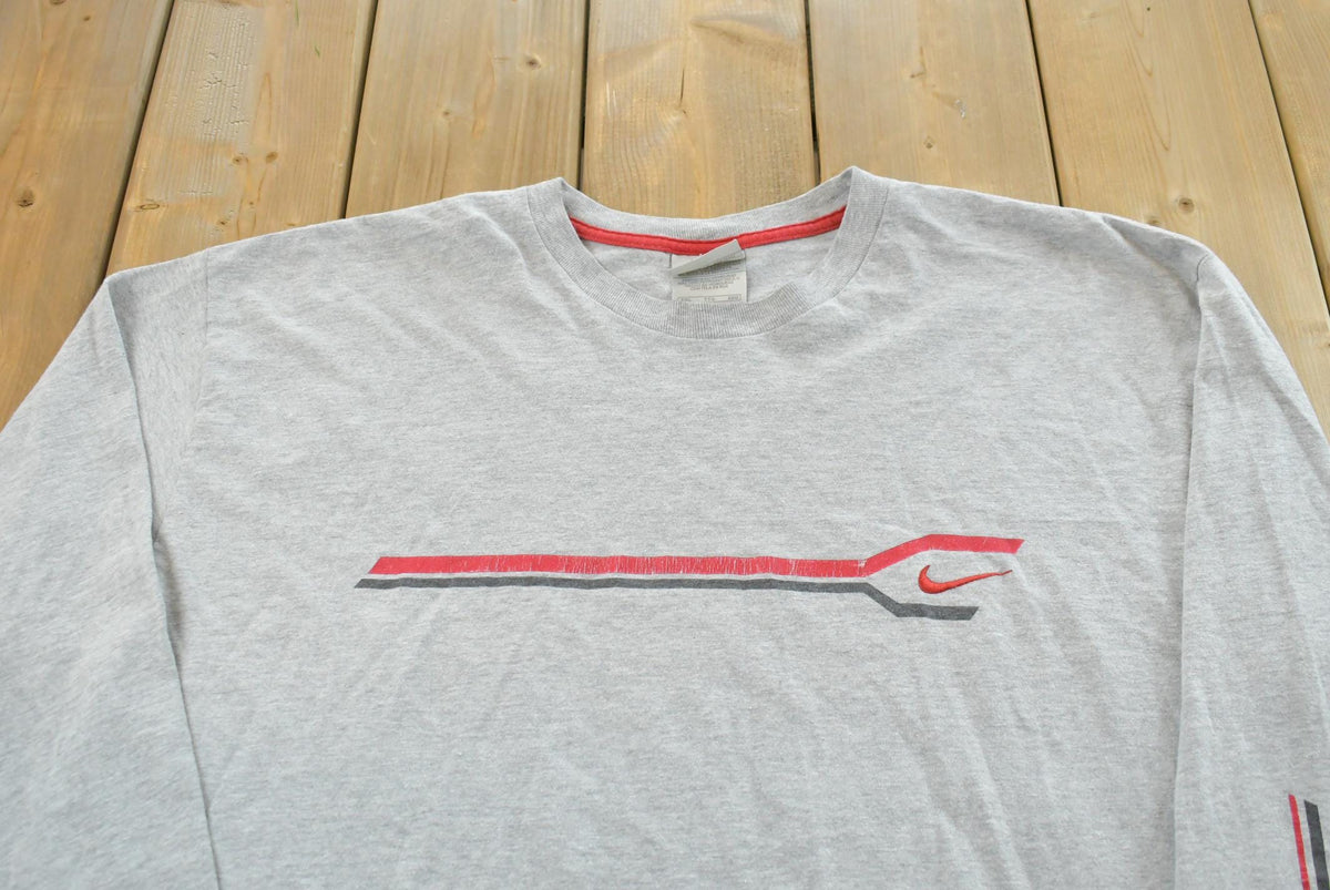 Vintage Y2K Nike Embroidered Logo Long Sleeve Shirt Men's XL from propervintagecanada