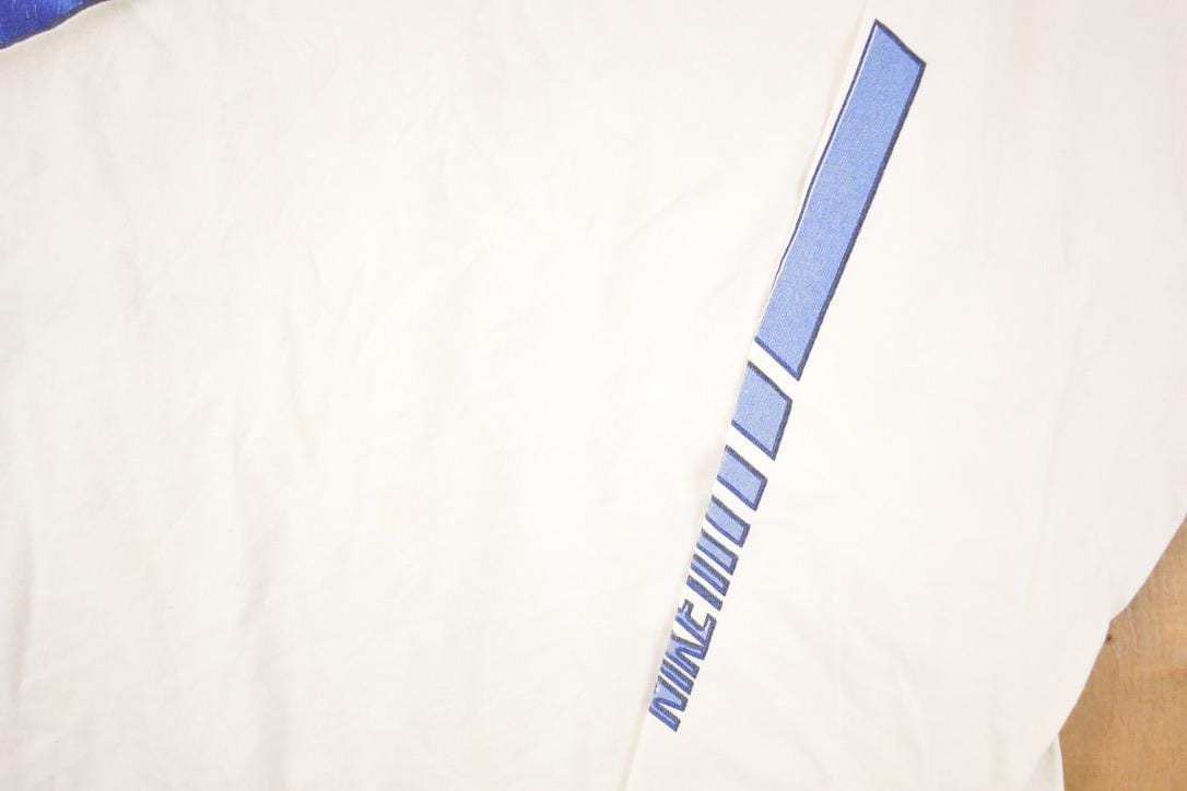 Vintage Y2K Nike Graphic Print Logo Swoosh Shirt Men's L from propervintagecanada