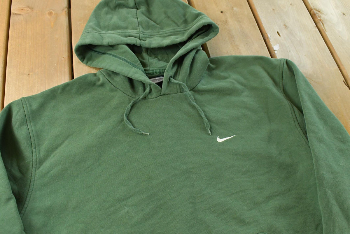 Vintage Y2K Nike Mini Swoosh Hoodie Men's L from propervintagecanada