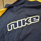 Vintage Y2K Nike Mini Swoosh Zip Up Windbreaker Jacket Men's 2XL from propervintagecanada
