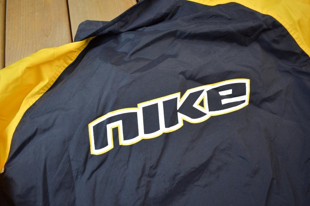 Vintage Y2K Nike Mini Swoosh Zip Up Windbreaker Jacket Men's 2XL from propervintagecanada