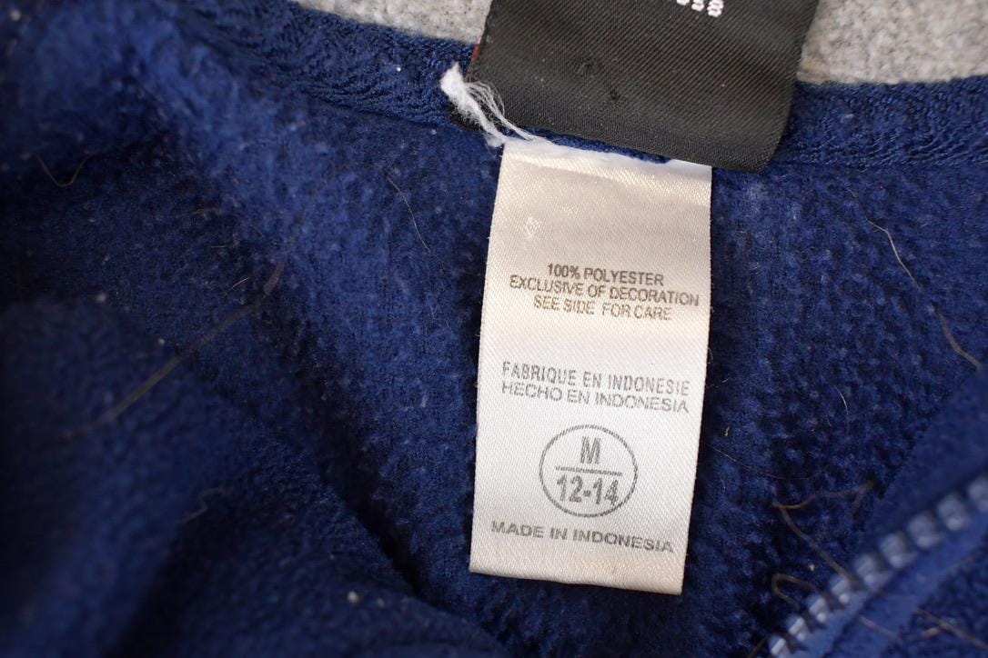Vintage Y2K Nike Toronto Maple Leafs Quarter Zip NHL Fleece Outdoorsman Sweater Youth M from propervintagecanada