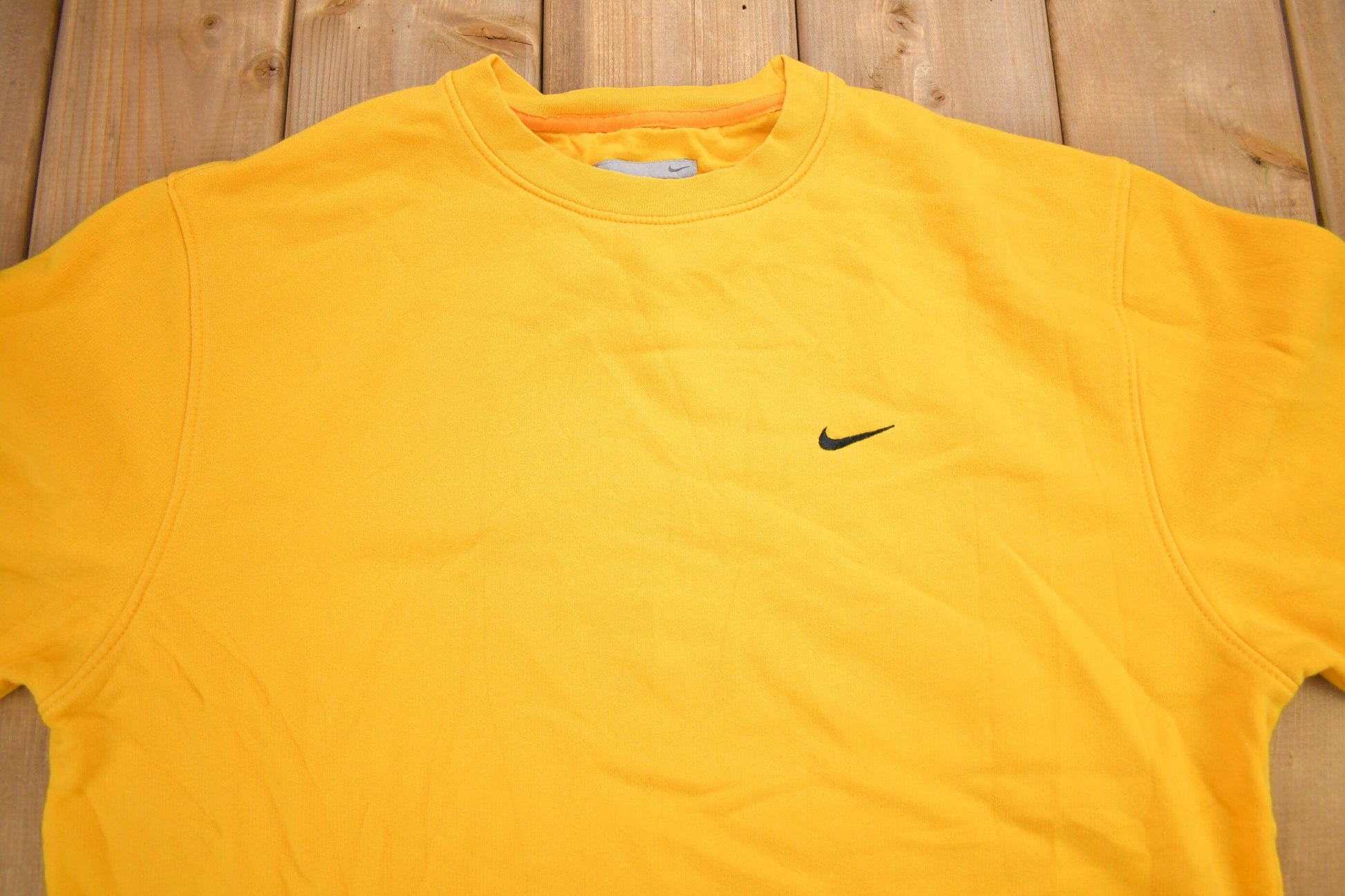 Vintage Y2K Nike Yellow Embroidered Mini Swoosh Crewneck Sweatshirt Men's Medium from propervintagecanada