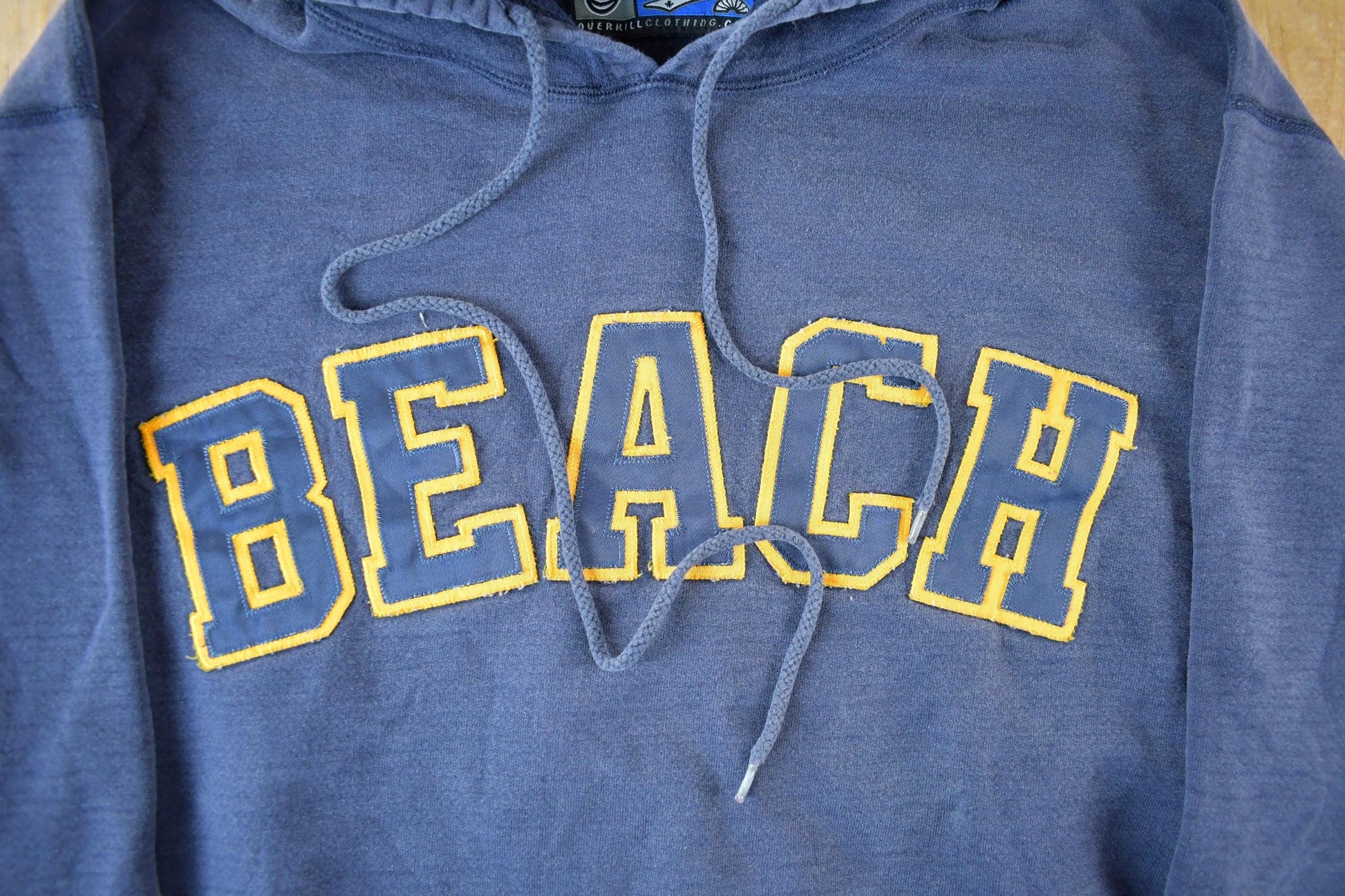 Vintage Y2K Overkill Beachwear Hoodie Men's Large from propervintagecanada