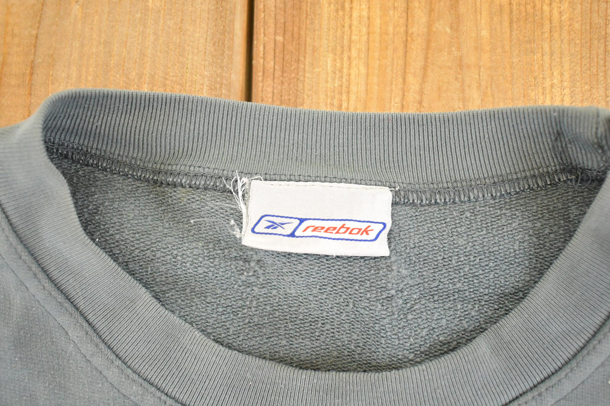Vintage Y2K Reebok Embroidered Souvenir Crewneck Sweatshirt Men's L from propervintagecanada