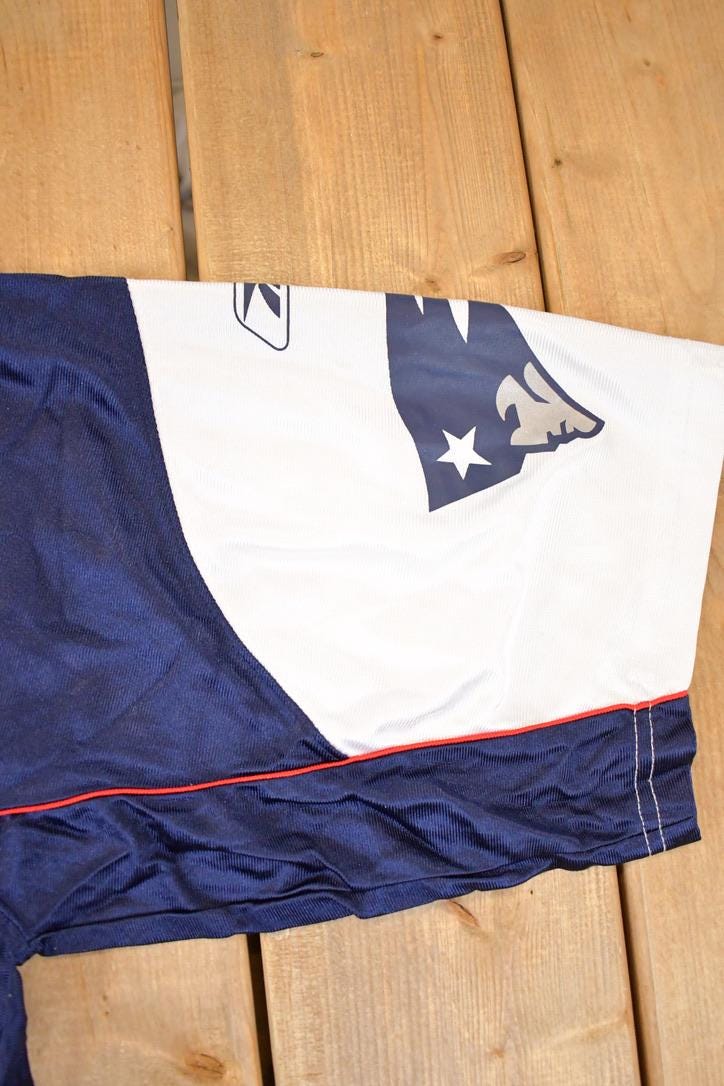 Vintage Y2K Reebok New England Patriots Tedy Bruschi NFL Jersey Men's L from propervintagecanada