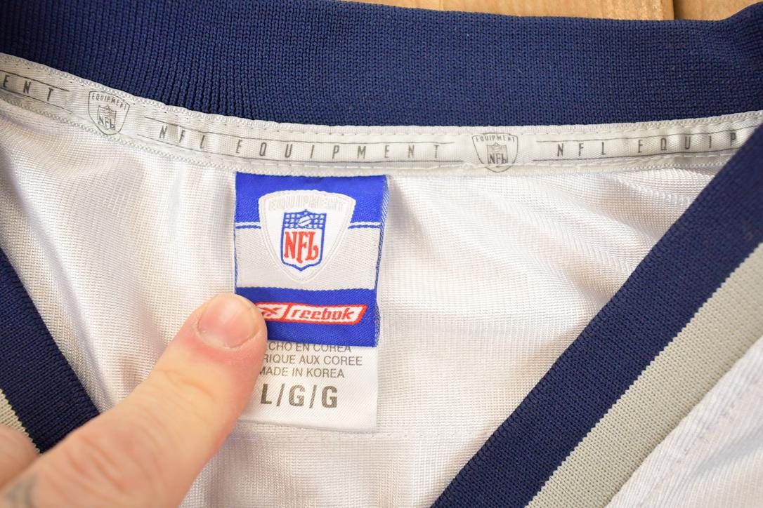 Vintage Y2K Reebok New England Patriots Tedy Bruschi NFL Jersey Men's L from propervintagecanada