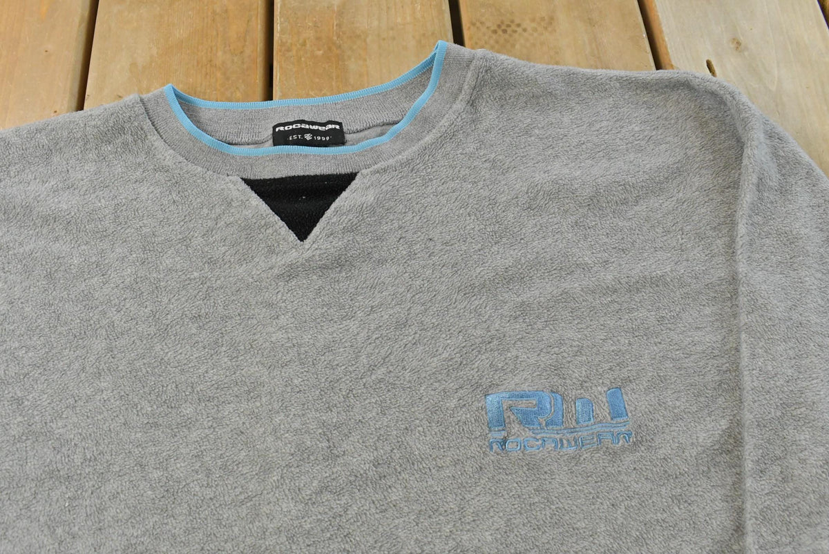 Vintage Y2K Rocawear Fleece Sweater Men's XL from propervintagecanada