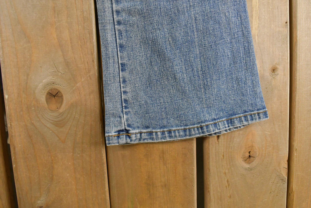 Vintage Y2K RT Low Rise Flare Denim Jeans Women's 28 x 32 from propervintagecanada