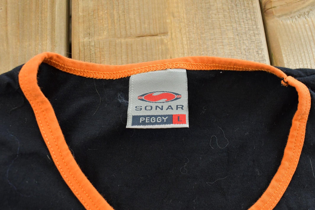 Vintage Y2K Sonar Peggy Berlin Star Ringer T Shirt Women's Medium from propervintagecanada