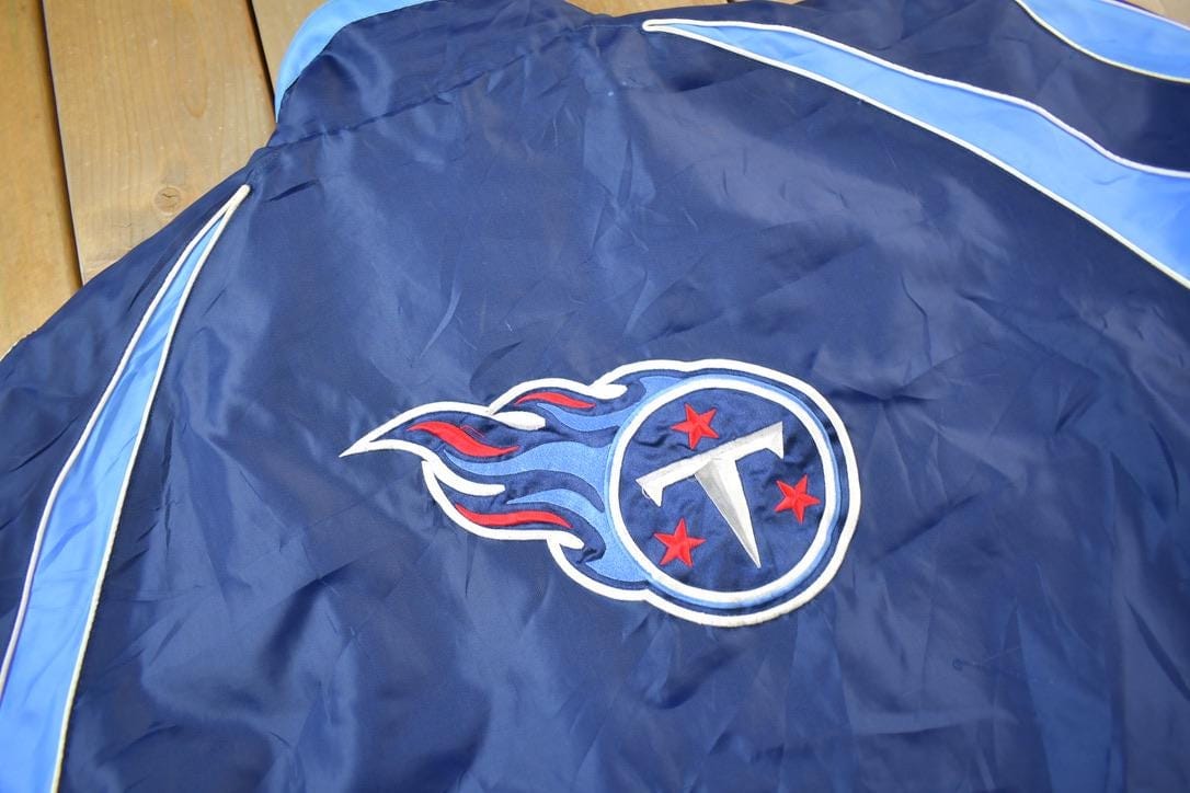 Vintage Y2K Tennessee Titans NFL Reversible Fleece Football Jacket Men's 2XL from propervintagecanada